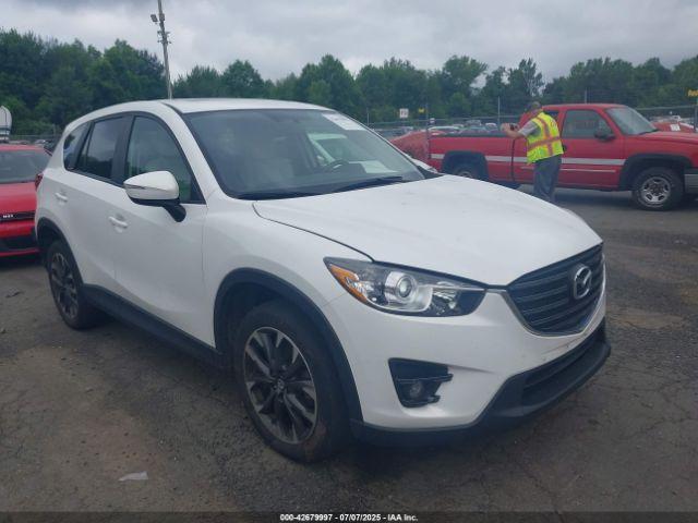  Salvage Mazda Cx